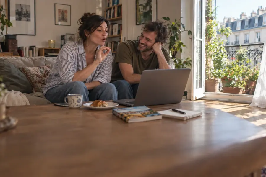 Couple learning Spanish together before a trip