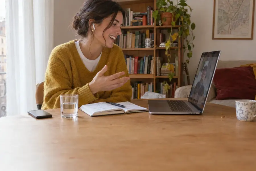 Native Spanish teacher giving an online Spanish lesson from her living room